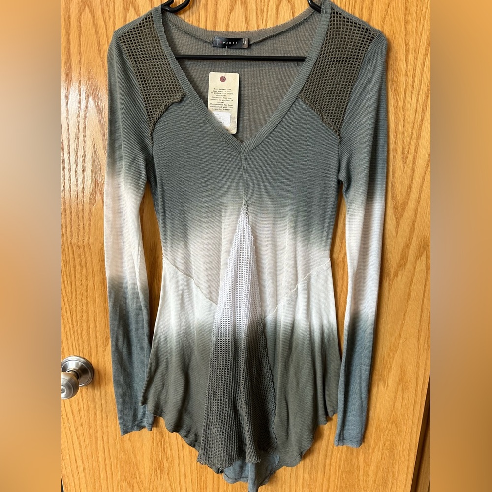 Women’s top size Small, brand new tags still on!
